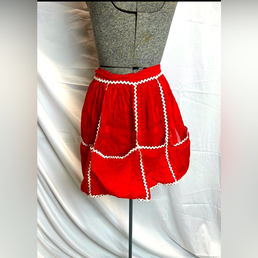 Cute vintage red apron with white rickrack trim & four pockets